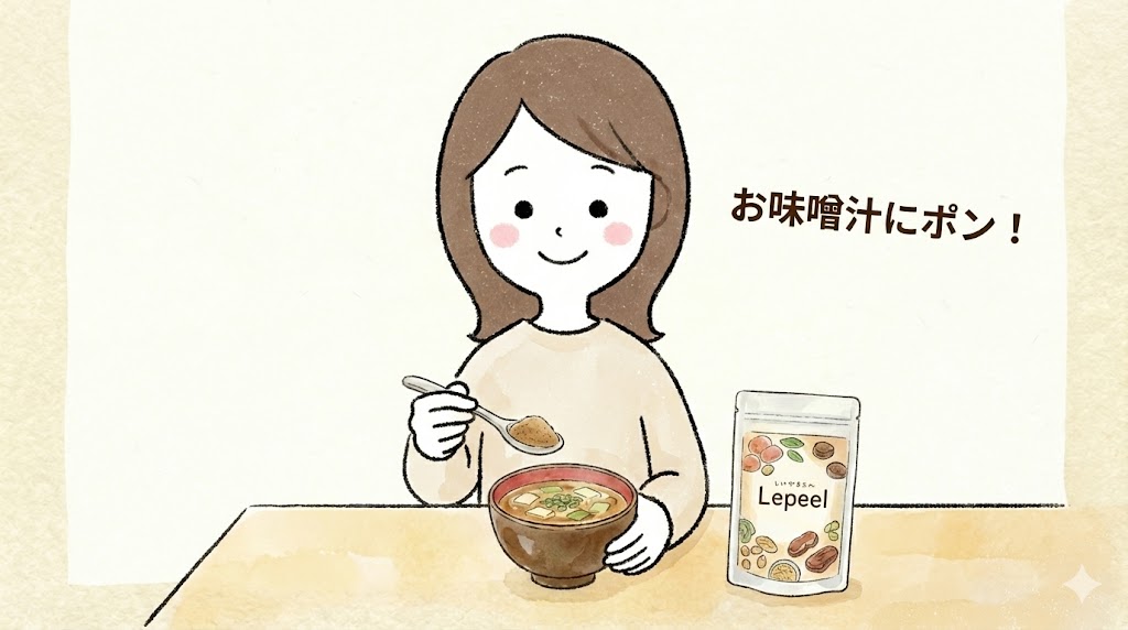 レピールまめ鉄をお味噌汁に入れて飲んでいる女性